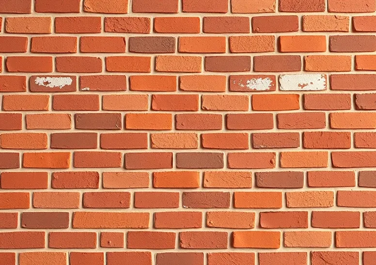 Ponçage et rebouchage des fissures avant mise en peinture